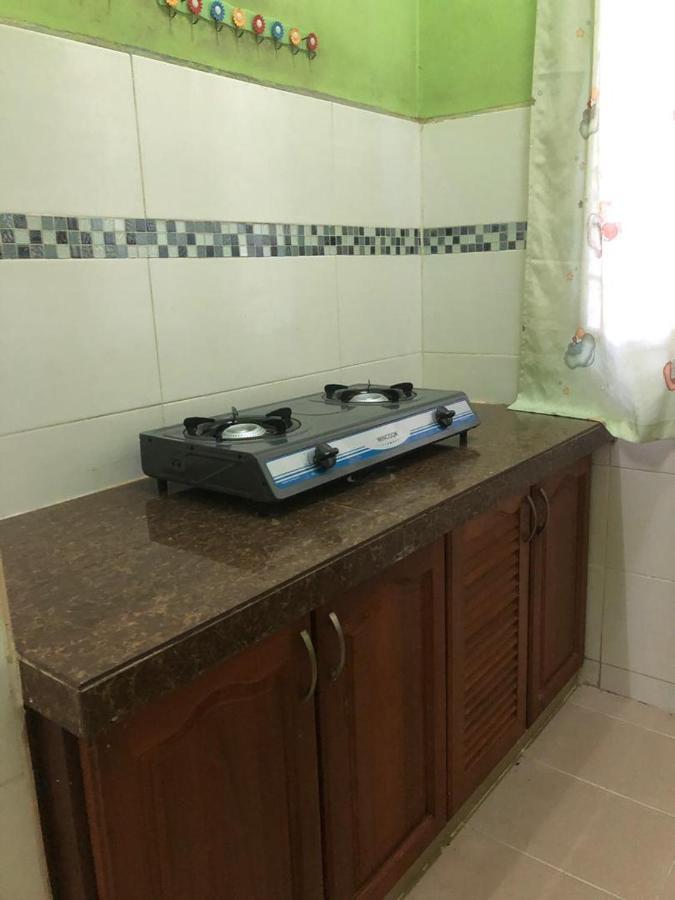 Afza Homestay Sura Free Unifi Kampong Sura Masjid Extérieur photo